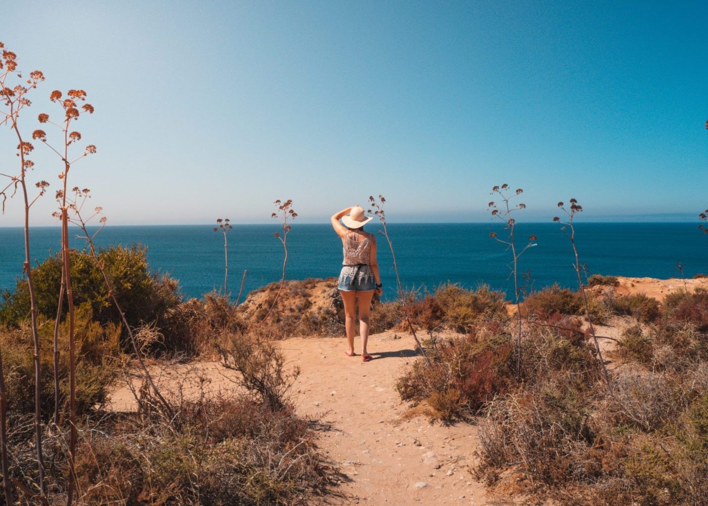 A female in Ponta da Piedade, a scenic spot in Portugal